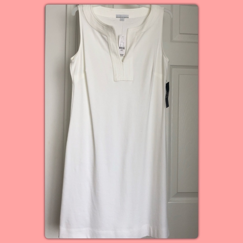 NWT- Never worn sleeveless dress in white